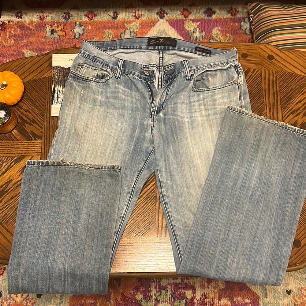 Extremely broken in Seven for all Mankind jeans